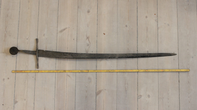 Illustration for article titled Danish Workers Unearth 'Still-Sharp' Medieval Sword While Digging Out Sewer